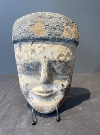 A death mask, a Ushabti, an oil lamp and a ritual cone with hieroglyphs, Egypt, 15th/1st C. B.C.