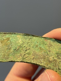 A varied collection of five Chinese bronze objects, 4th C. B.C./15th C.