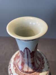 A Chinese copper-red-decorated 'lotus scroll' bottle vase, Qianlong