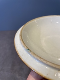A Chinese Canton famille rose bowl and cover with figures in a landscape, Qianlong