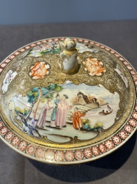 A Chinese Canton famille rose bowl and cover with figures in a landscape, Qianlong