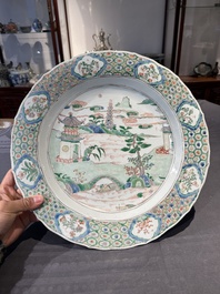 A Chinese famille verte 'river landscape' dish, artemisia leaf mark, Kangxi
