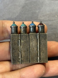 A pair of four-fold Chinese enamelled and engraved silver medicine bottles, 19th C.