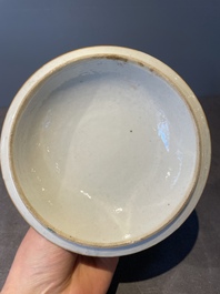 A Chinese Canton famille rose bowl and cover with figures in a landscape, Qianlong