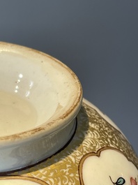 A Chinese Canton famille rose bowl and cover with figures in a landscape, Qianlong