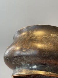A varied collection of five Chinese bronze objects, 4th C. B.C./15th C.