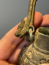 A varied collection of five Chinese bronze objects, 4th C. B.C./15th C.