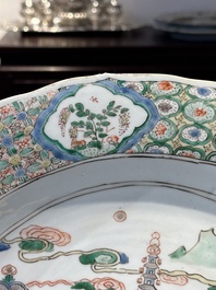 A Chinese famille verte 'river landscape' dish, artemisia leaf mark, Kangxi