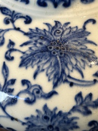 A Chinese blue and white 'lotus scroll' bottle vase, 18/19th C.