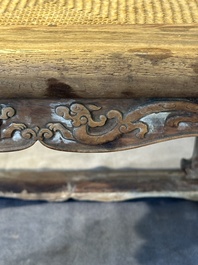 A Chinese rectangular huanghuali wooden stool with 'chilong' design, 17/18th C.