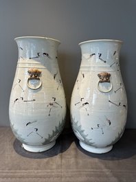 A pair of Chinese famille rose vases with cranes, 19th C.