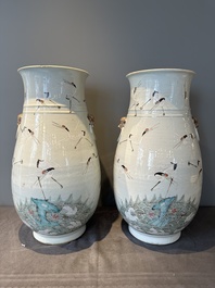A pair of Chinese famille rose vases with cranes, 19th C.