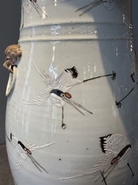 A pair of Chinese famille rose vases with cranes, 19th C.