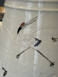 A pair of Chinese famille rose vases with cranes, 19th C.