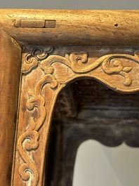 A Chinese rectangular huanghuali wooden stool with 'chilong' design, 17/18th C.