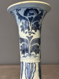 A blue and white Dutch Delft bottle-shaped chinoiserie vase with a lion, 17th C.