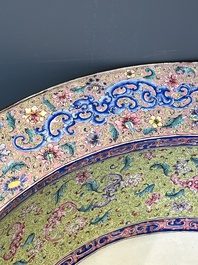 An exceptionally large Chinese Canton enamel basin with floral design, Yongzheng