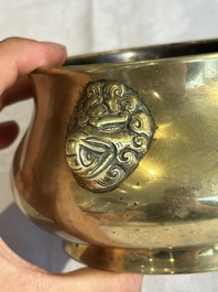 A Chinese bronze elephant-head-handled censer, Xuande mark, Kangxi/Qianlong
