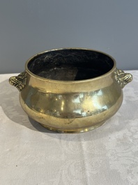 A Chinese bronze elephant-head-handled censer, Xuande mark, Kangxi/Qianlong