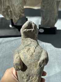 Two Gandhara grey schist torsos of Buddha and a tiger sculpture, 1st/3rd C.
