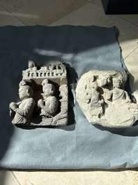 A Gandhara grey schist fragment of a seated Buddha with his disciple and a fragment with five figures, 1st/3rd C.