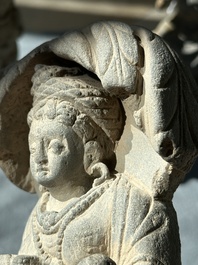 A Gandhara grey schist sculpture of the Bodhisattva Maitreya, a sculpture of a master with a child and a fragment of a divinity, 1/5th C.