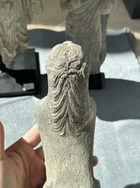 Two Gandhara grey schist torsos of Buddha and a tiger sculpture, 1st/3rd C.