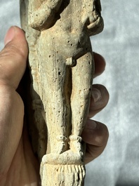 A Gandhara grey schist sculpture of the Bodhisattva Maitreya, a sculpture of a master with a child and a fragment of a divinity, 1/5th C.
