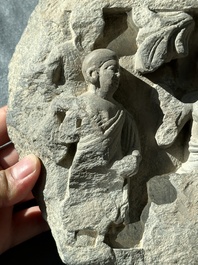 A Gandhara grey schist fragment of a seated Buddha with his disciple and a fragment with five figures, 1st/3rd C.