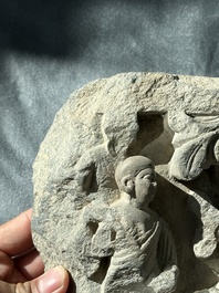 A Gandhara grey schist fragment of a seated Buddha with his disciple and a fragment with five figures, 1st/3rd C.