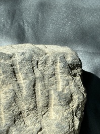 A Gandhara grey schist fragment of a seated Buddha with his disciple and a fragment with five figures, 1st/3rd C.