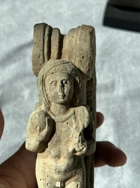 A Gandhara grey schist sculpture of the Bodhisattva Maitreya, a sculpture of a master with a child and a fragment of a divinity, 1/5th C.