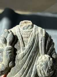 Two Gandhara grey schist torsos of Buddha and a tiger sculpture, 1st/3rd C.