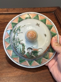 A Chinese famille verte covered vase and a bottle vase, 19th C.