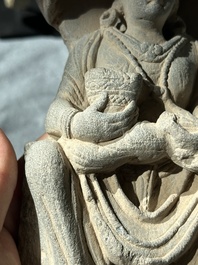 A Gandhara grey schist sculpture of the Bodhisattva Maitreya, a sculpture of a master with a child and a fragment of a divinity, 1/5th C.