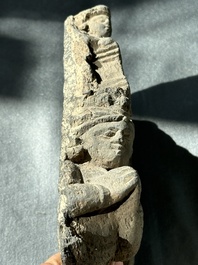 A Gandhara grey schist fragment of a seated Buddha with his disciple and a fragment with five figures, 1st/3rd C.