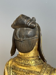 An extremely rare Chinese gilt bronze figure of Guandi, Ming