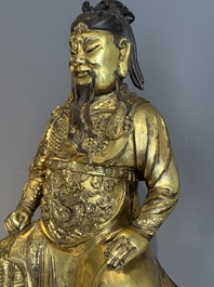 An extremely rare Chinese gilt bronze figure of Guandi, Ming