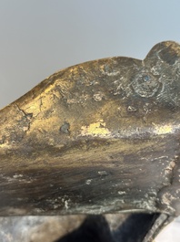 An extremely rare Chinese gilt bronze figure of Guandi, Ming