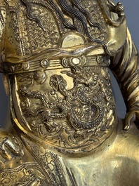 An extremely rare Chinese gilt bronze figure of Guandi, Ming