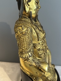 An extremely rare Chinese gilt bronze figure of Guandi, Ming