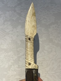 A varied collection of two daggers, two swords and forearm protection, India and Turkey, 19th C.