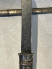 A varied collection of two daggers, two swords and forearm protection, India and Turkey, 19th C.