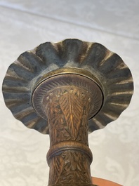 A gilt copper and enamelled water pipe base on wooden stand, Qajar, Iran, 19th C.