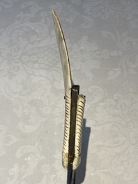 A varied collection of two daggers, two swords and forearm protection, India and Turkey, 19th C.