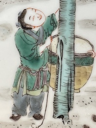 A Chinese famille verte dish with a sage and two boys under a tree, Shizhu 石竹 seal mark, Yongzheng