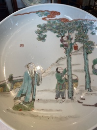 A Chinese famille verte dish with a sage and two boys under a tree, Shizhu 石竹 seal mark, Yongzheng