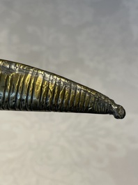 A varied collection of two daggers, two swords and forearm protection, India and Turkey, 19th C.