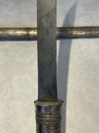 A varied collection of two daggers, two swords and forearm protection, India and Turkey, 19th C.