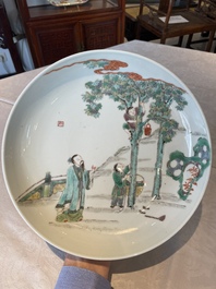 A Chinese famille verte dish with a sage and two boys under a tree, Shizhu 石竹 seal mark, Yongzheng